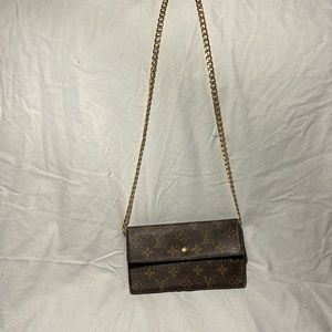 Louis Vuitton Bifold crossbody long wallet/bag.